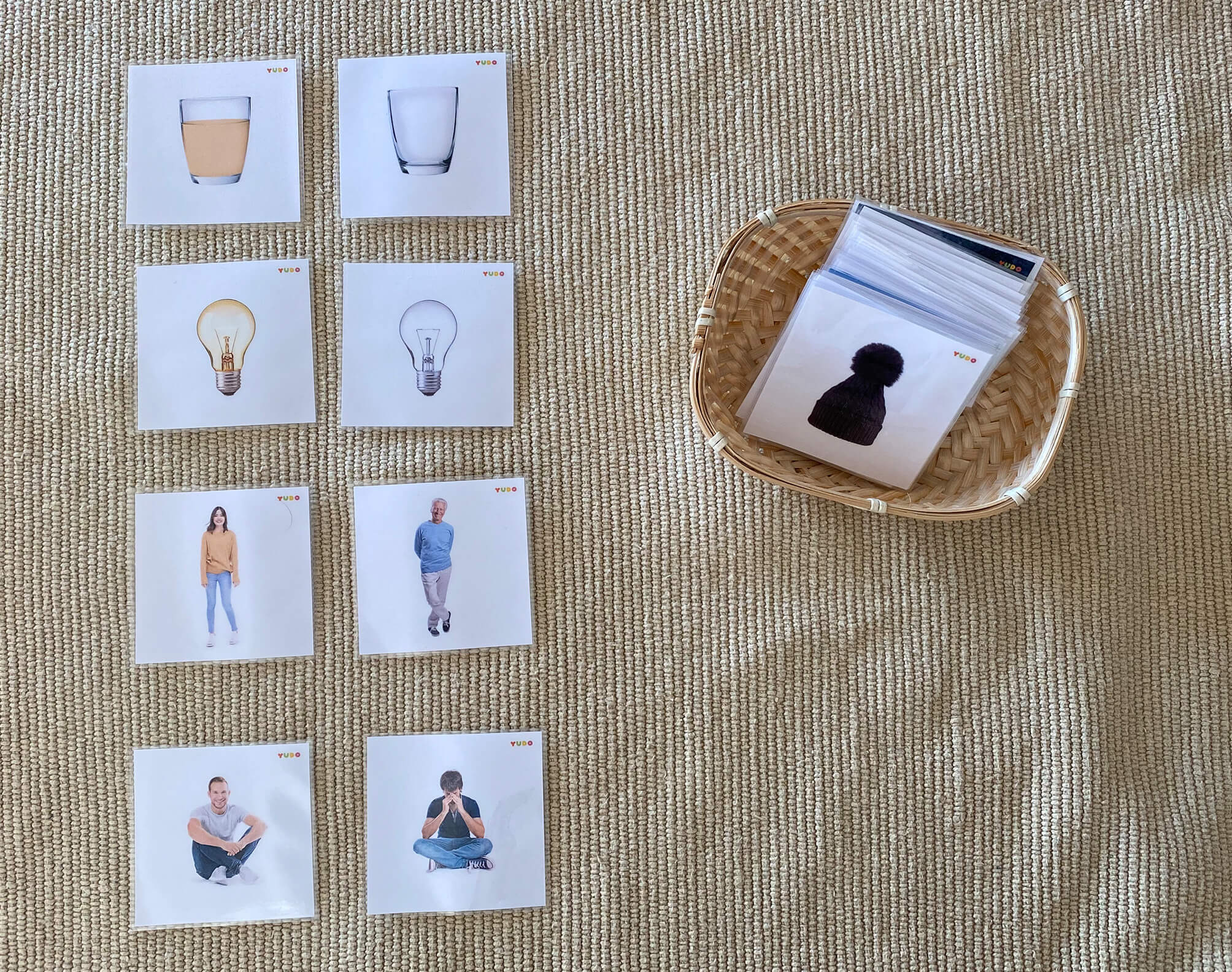Child using Montessori language development cards for matching activities