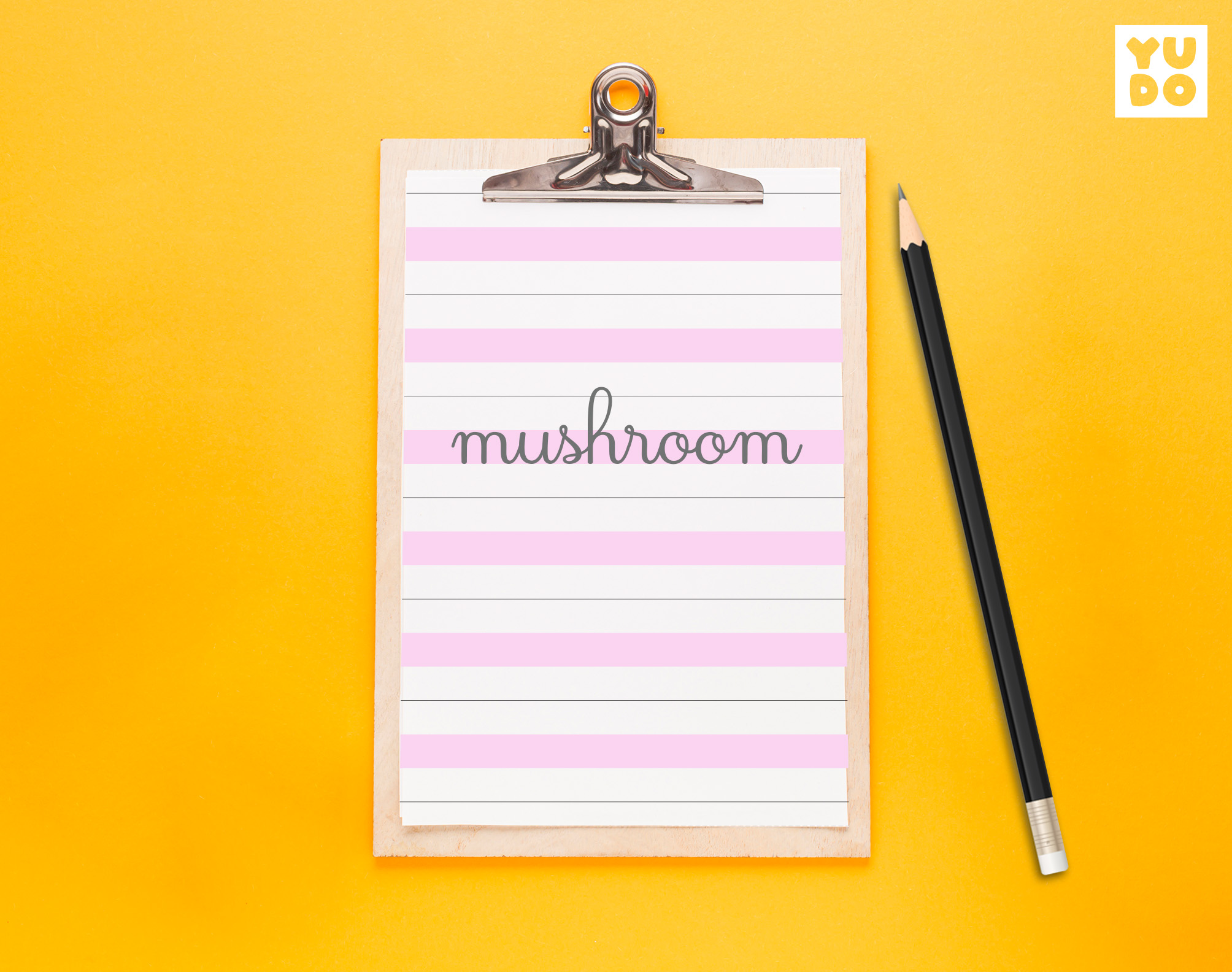 Montessori handwriting paper printable on a clipboard with pencil