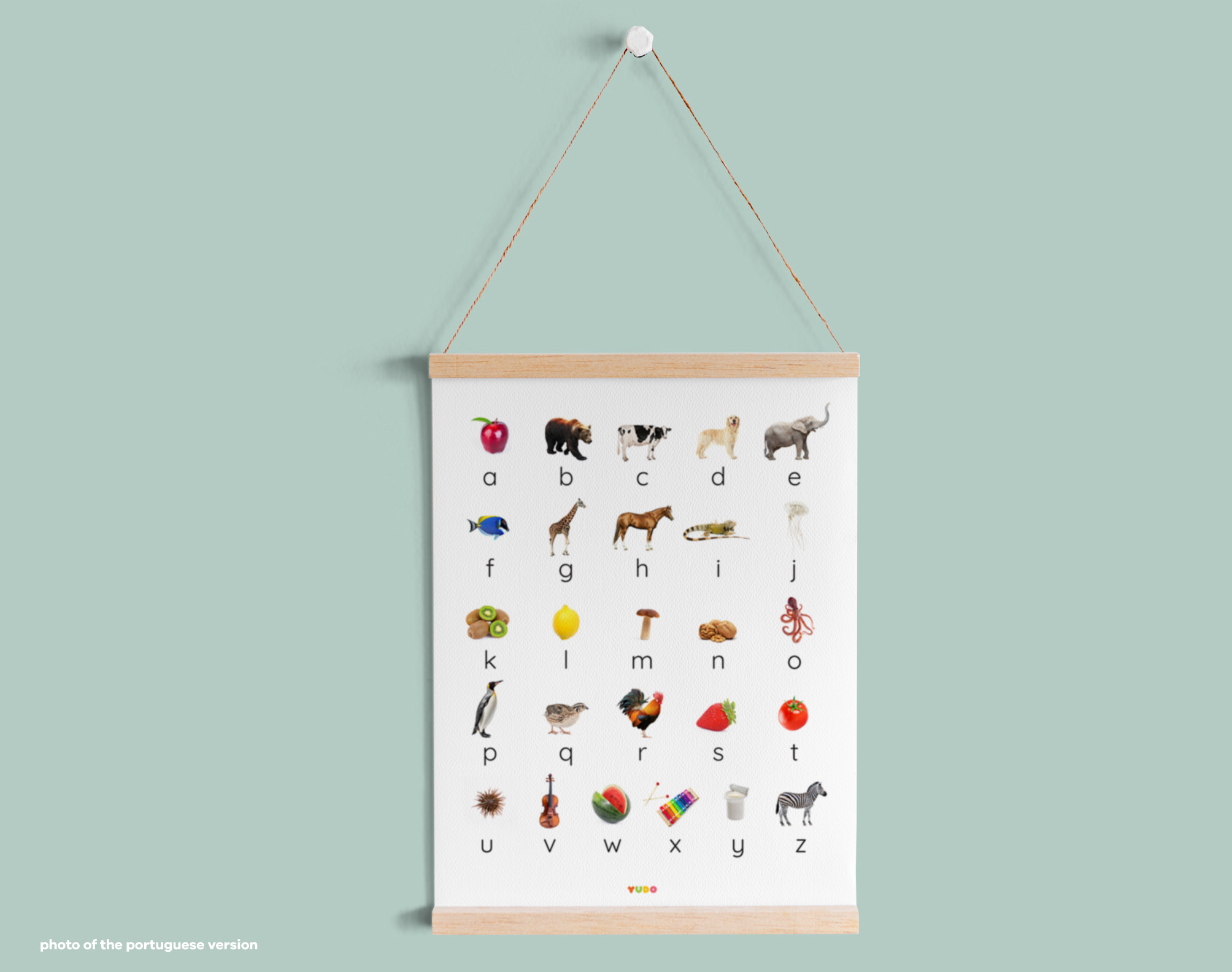 Montessori beginning sounds poster displayed on a classroom wall